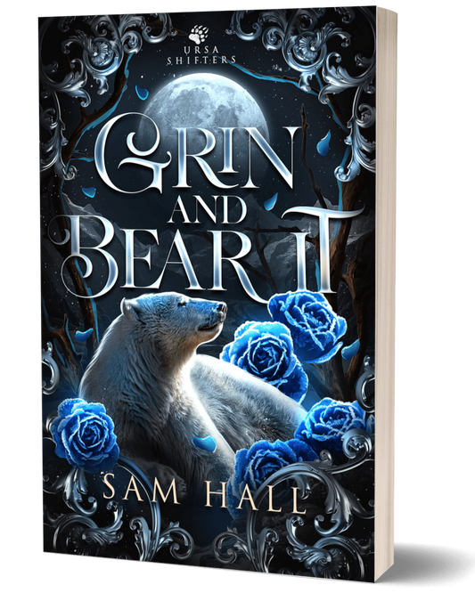 Book cover of 'Grin and Bear It' with a polar bear and blue roses on a dark background