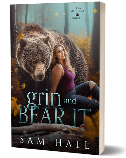 Book cover of 'Grin and Bear It' by Sam Hall featuring a bear and a woman in a forest setting.